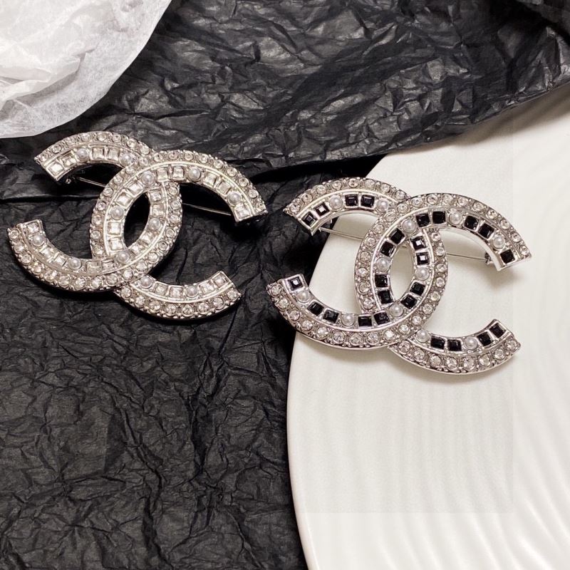 Ch*el brooches